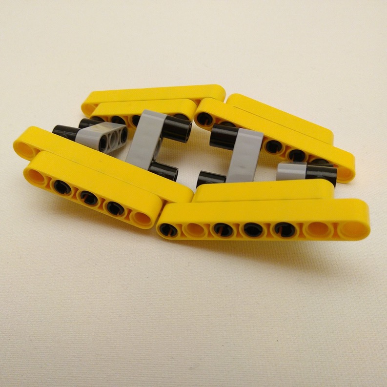 Divisible Möbius strip, hinged connection, spiraling 2