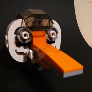 Lego model of the head of an orange-billed stork