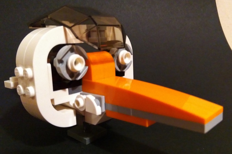 Lego model of the head of an orange-billed stork